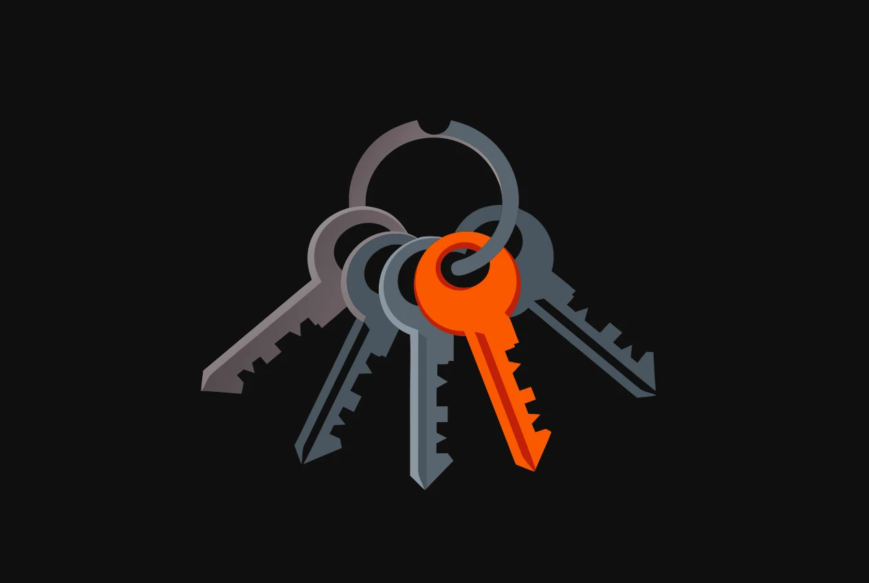 A key ring holding six fanned keys, one key sitting forward of the rest and coloured orange.