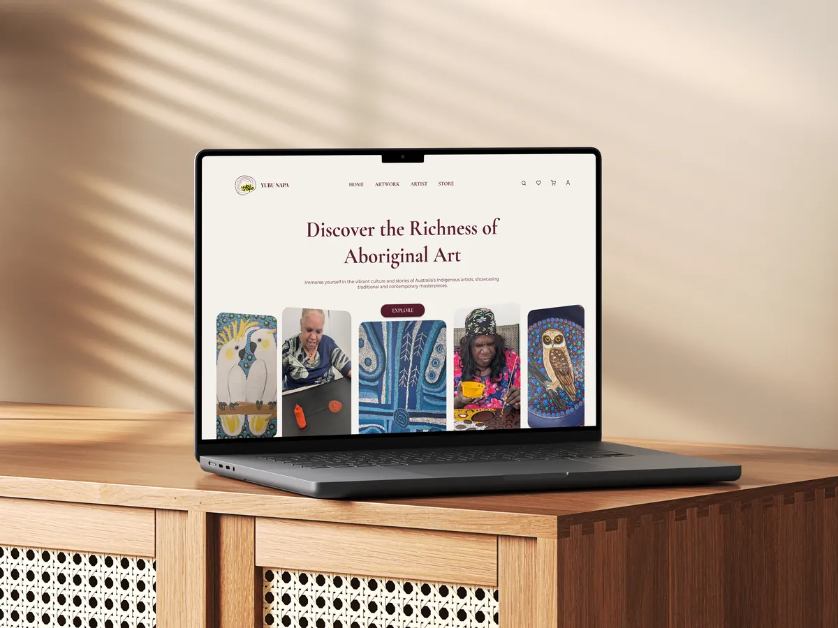 Example landing page for an Aboriginal art gallery and store, shown on a laptop: the headline "Discover the richness of Aboriginal art" above a row of artworks and artists.